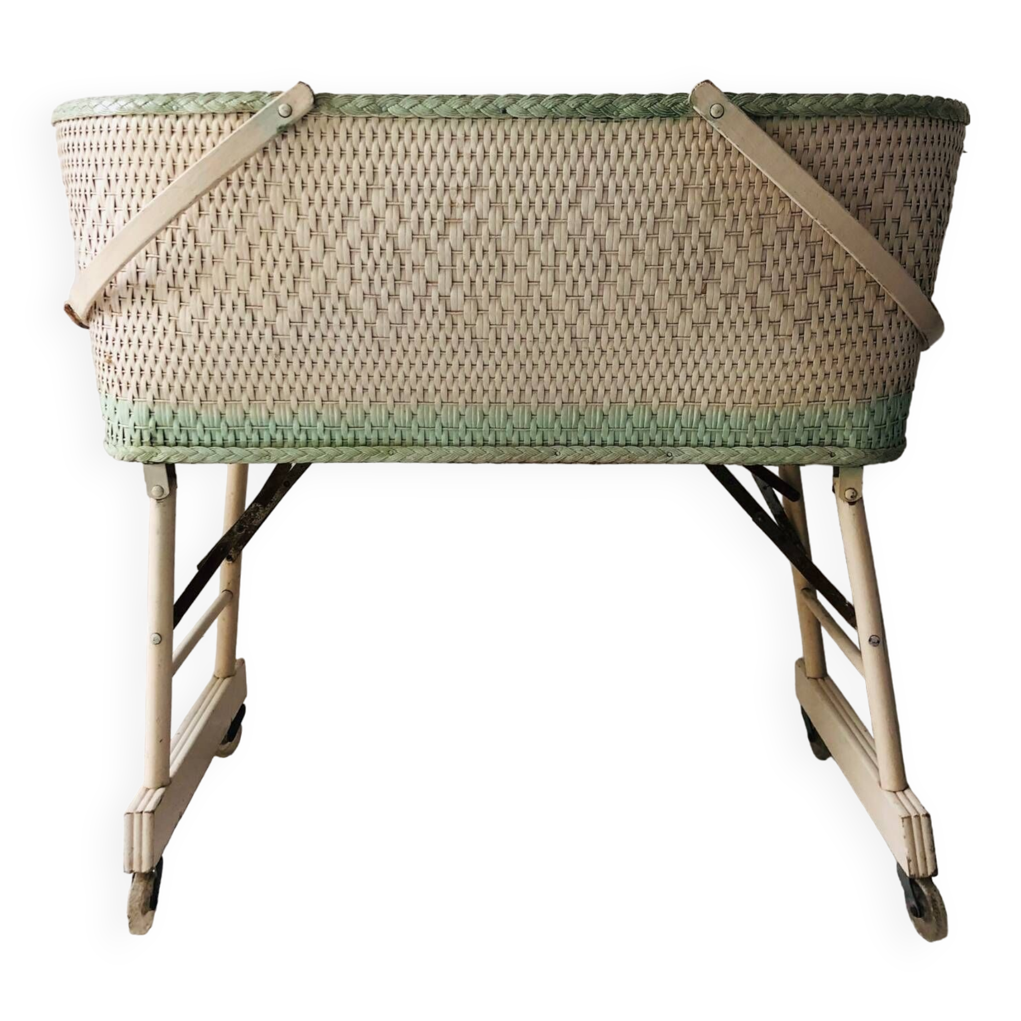 Wood and wicker cradle from the 1950s.