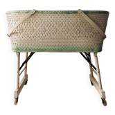 Wood and wicker cradle from the 1950s.