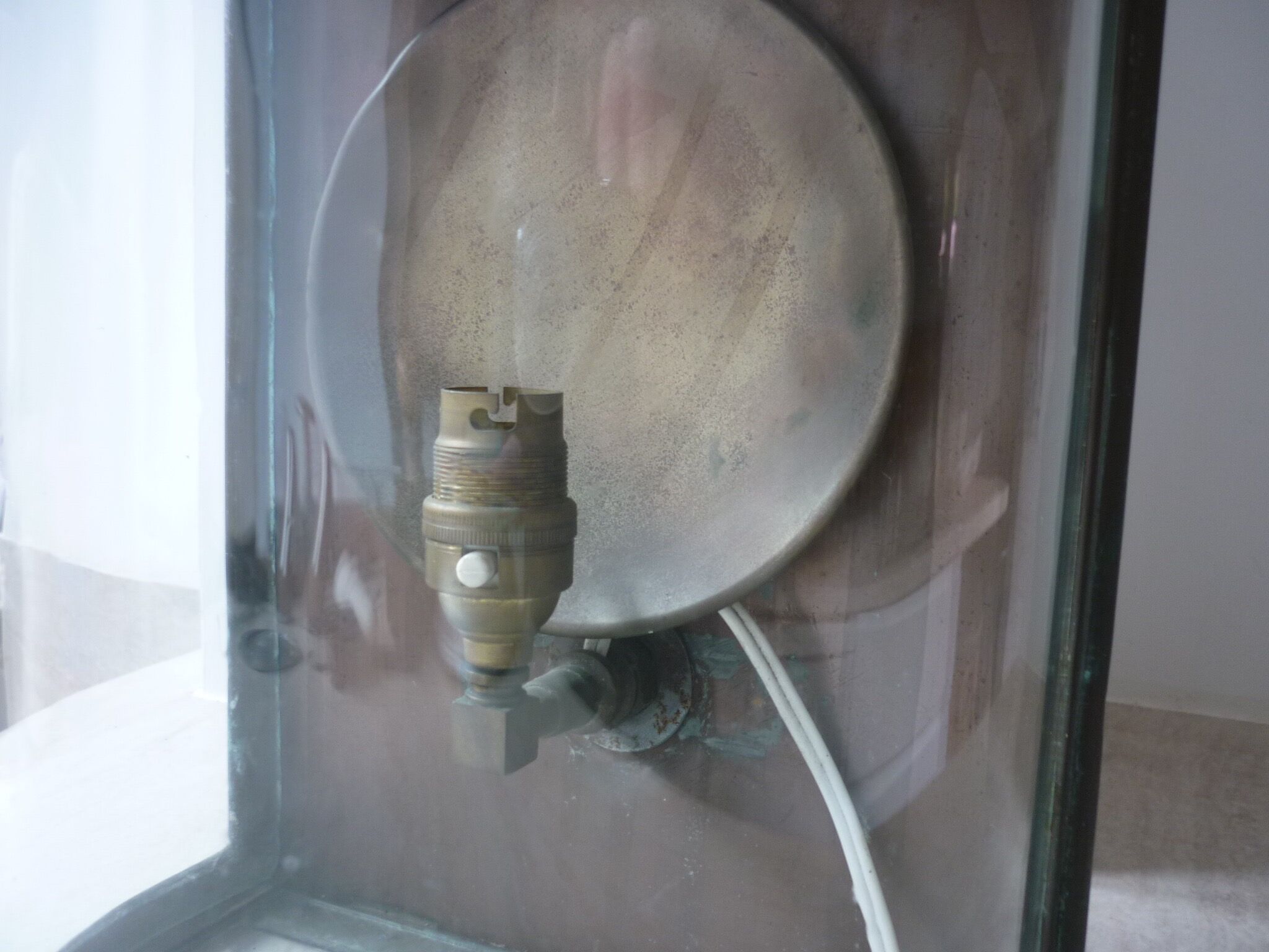 Ancient half-moon brass wall lantern