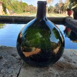 Old demijohn, 19th century bubbled glass