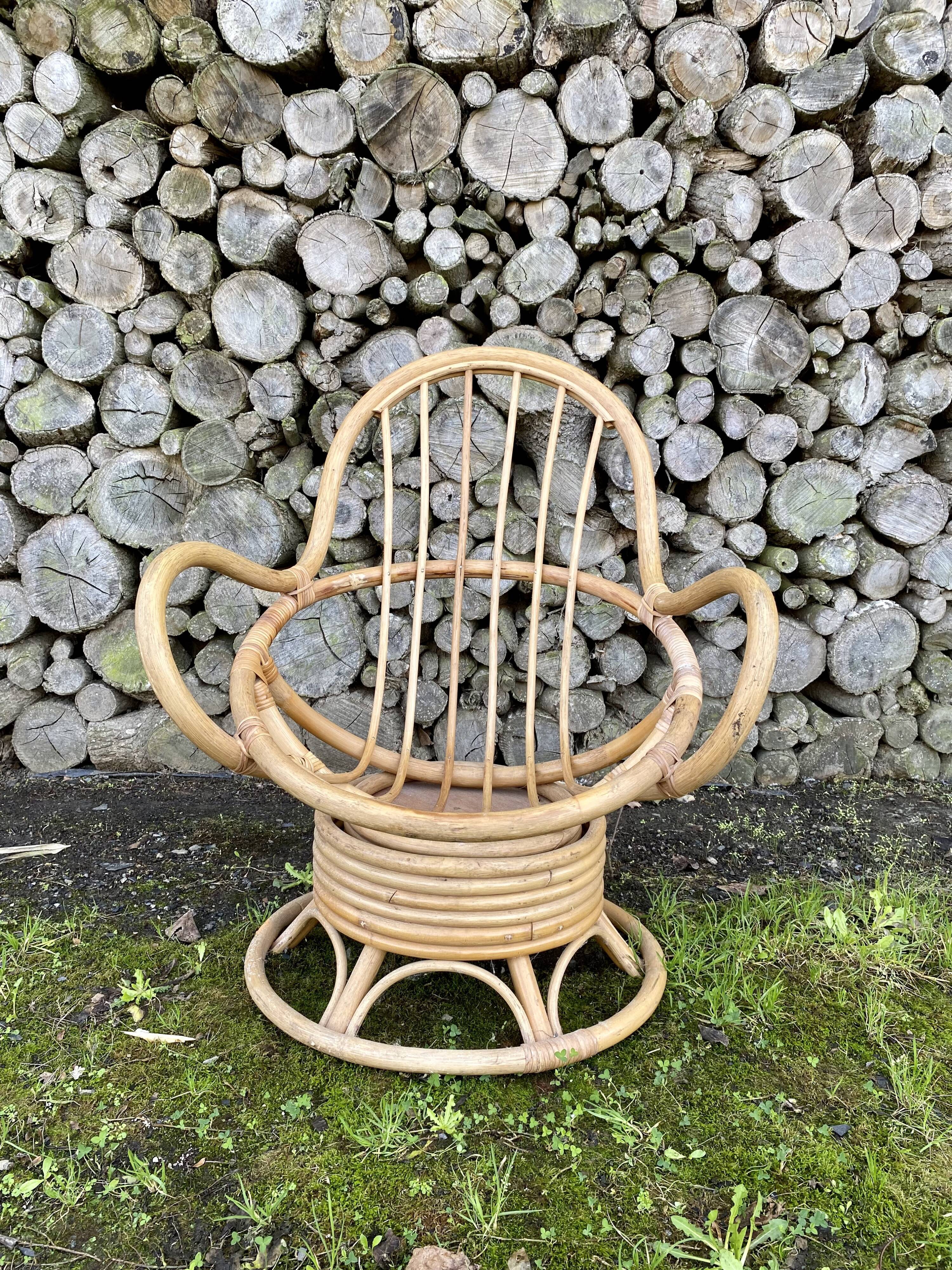 Swivel rattan armchair