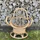 Swivel rattan armchair