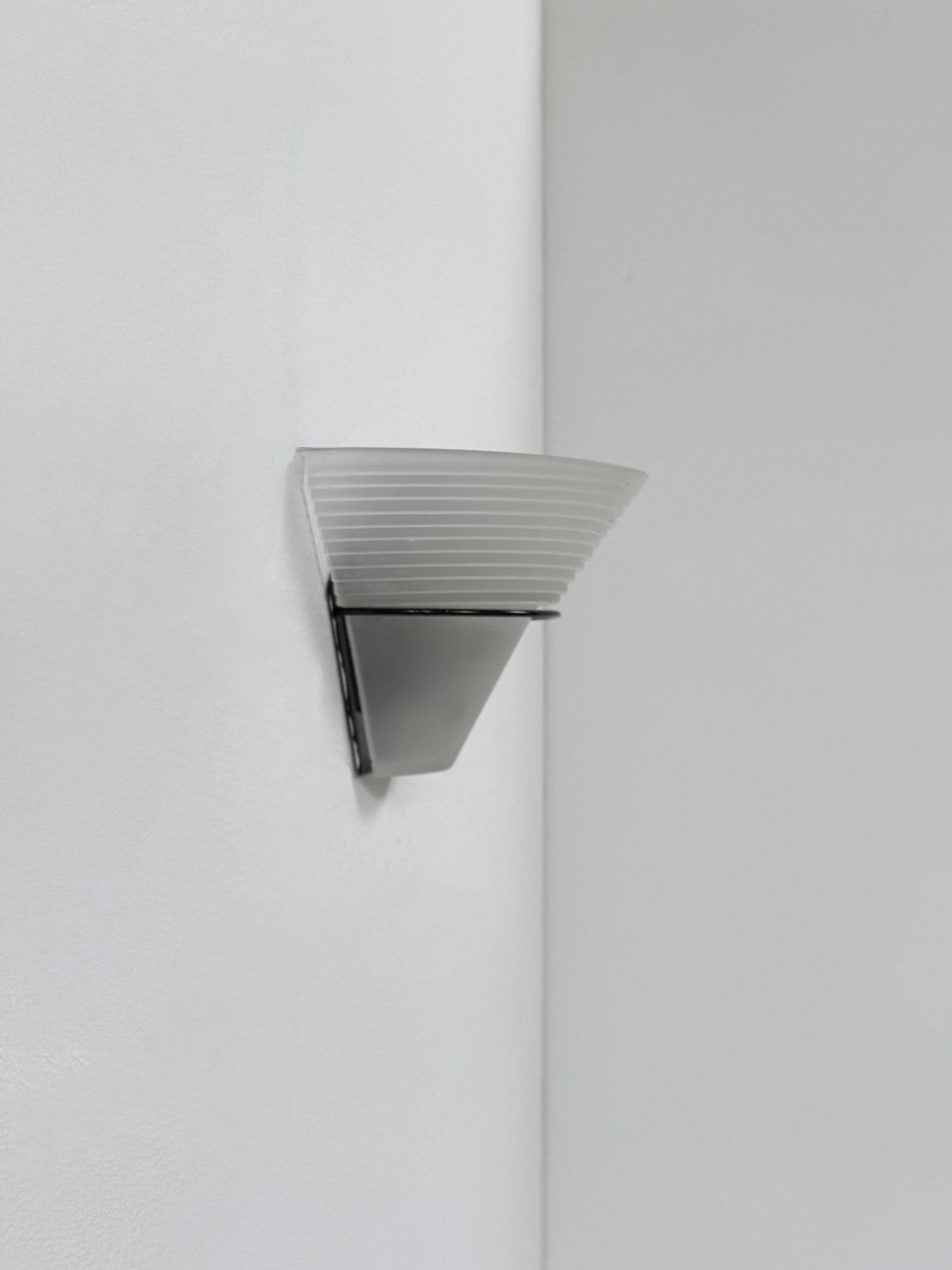 Frosted glass and black metal wall light, Italy, 1980.