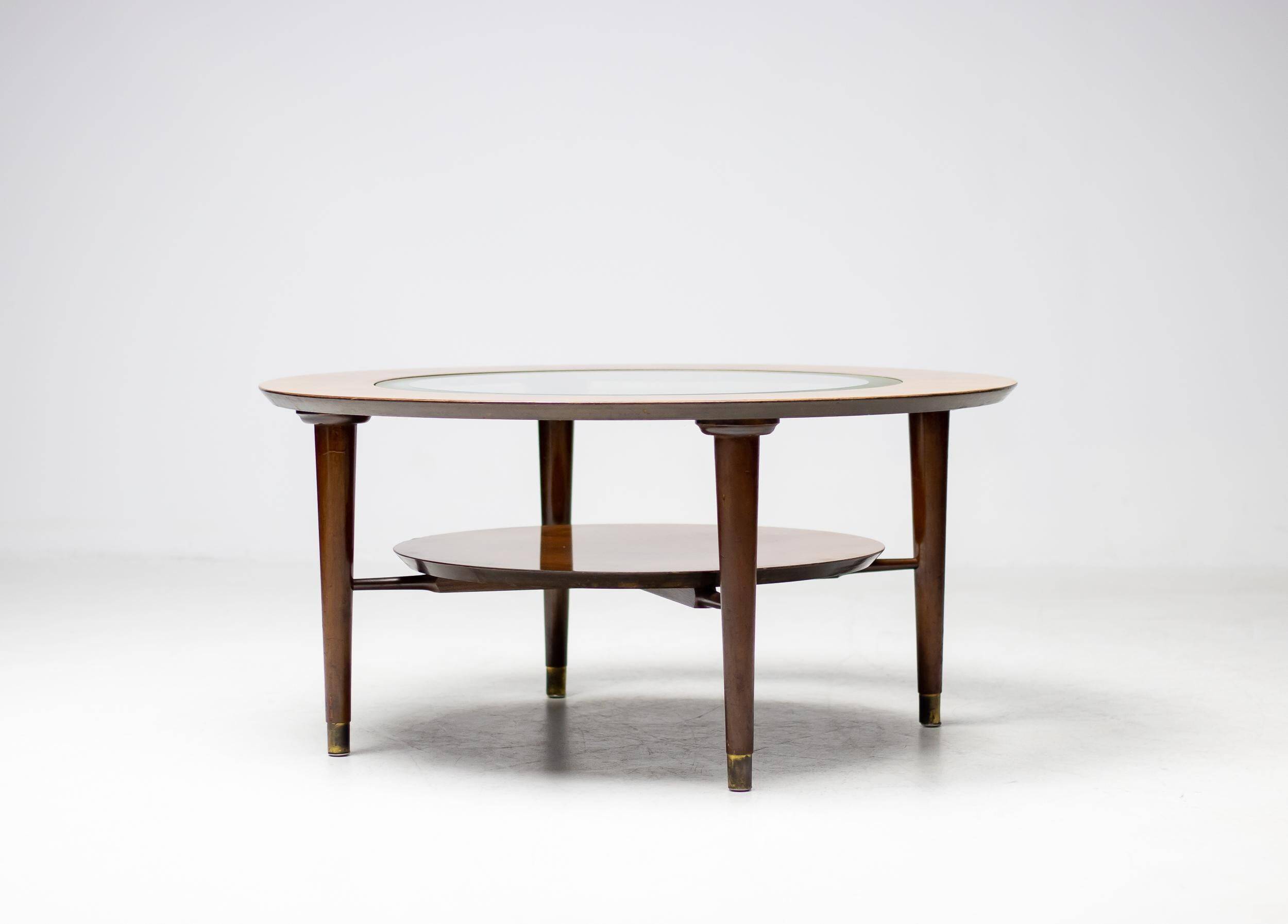 Sculptural coffee table in walnut and glass, Italy, 1950.