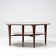 Sculptural coffee table in walnut and glass, Italy, 1950.