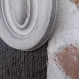 Pair of patinated oval woodwork