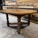 Antique oak round table with extensions, beautifully made from the years.
