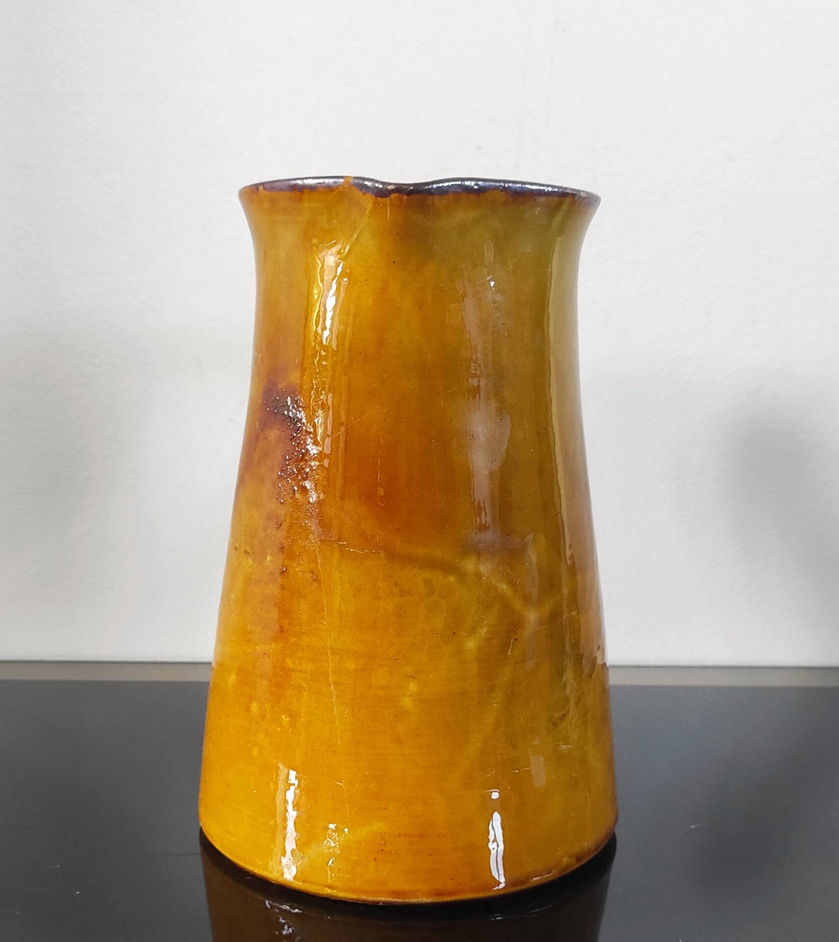 Vintage glazed terracotta pitcher