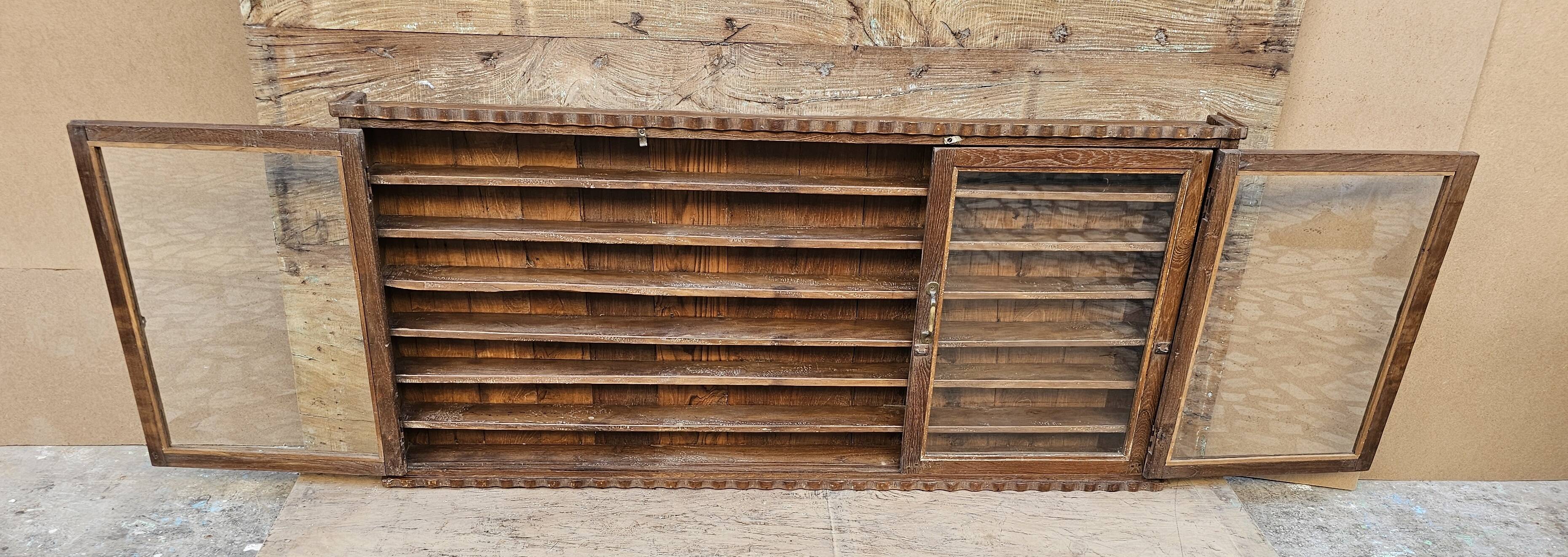 Antique Burmese teak collector's wall display case
