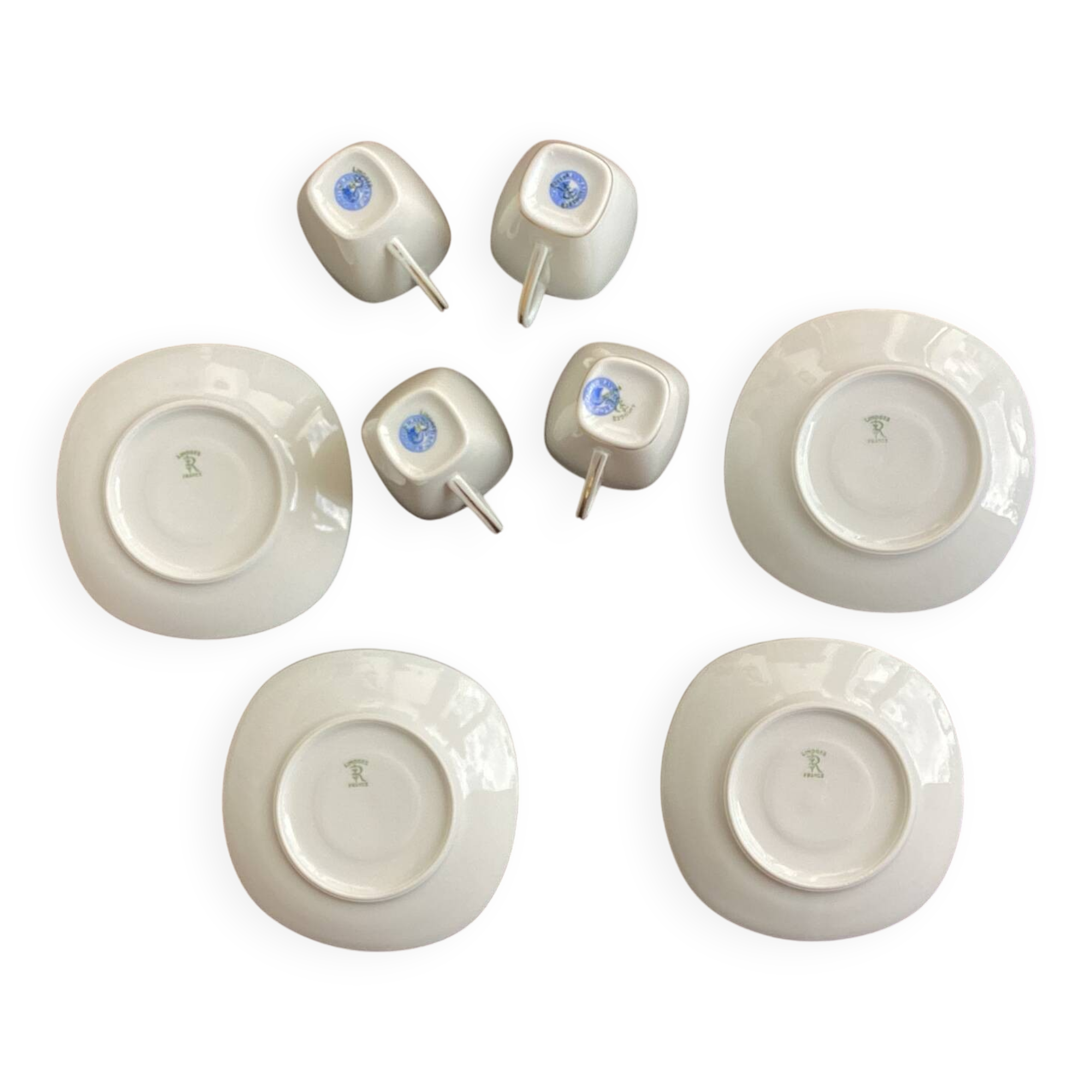 Cups and saucers fine porcelain Raynaud