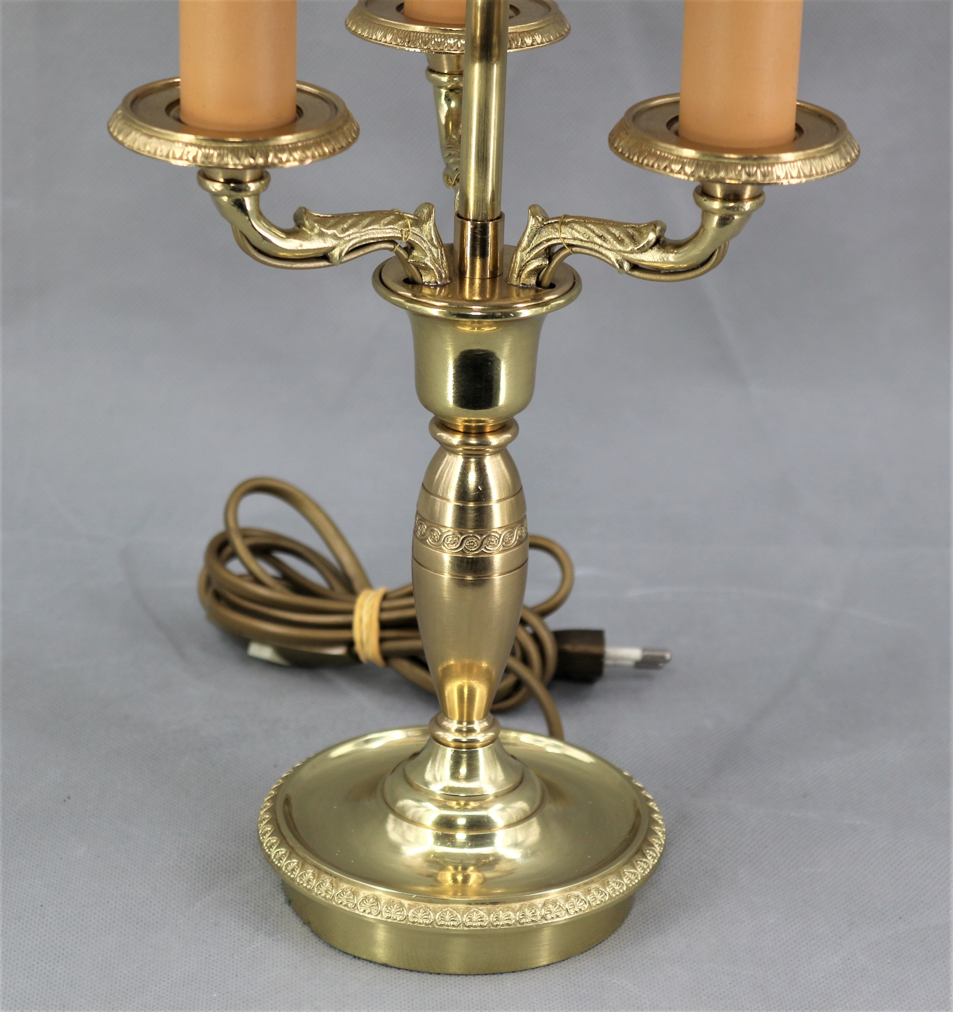 Empire style hot water bottle lamp in solid bronze three lights Lucien Gau