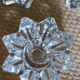 A set of 3 vintage star flower glass candle holders.