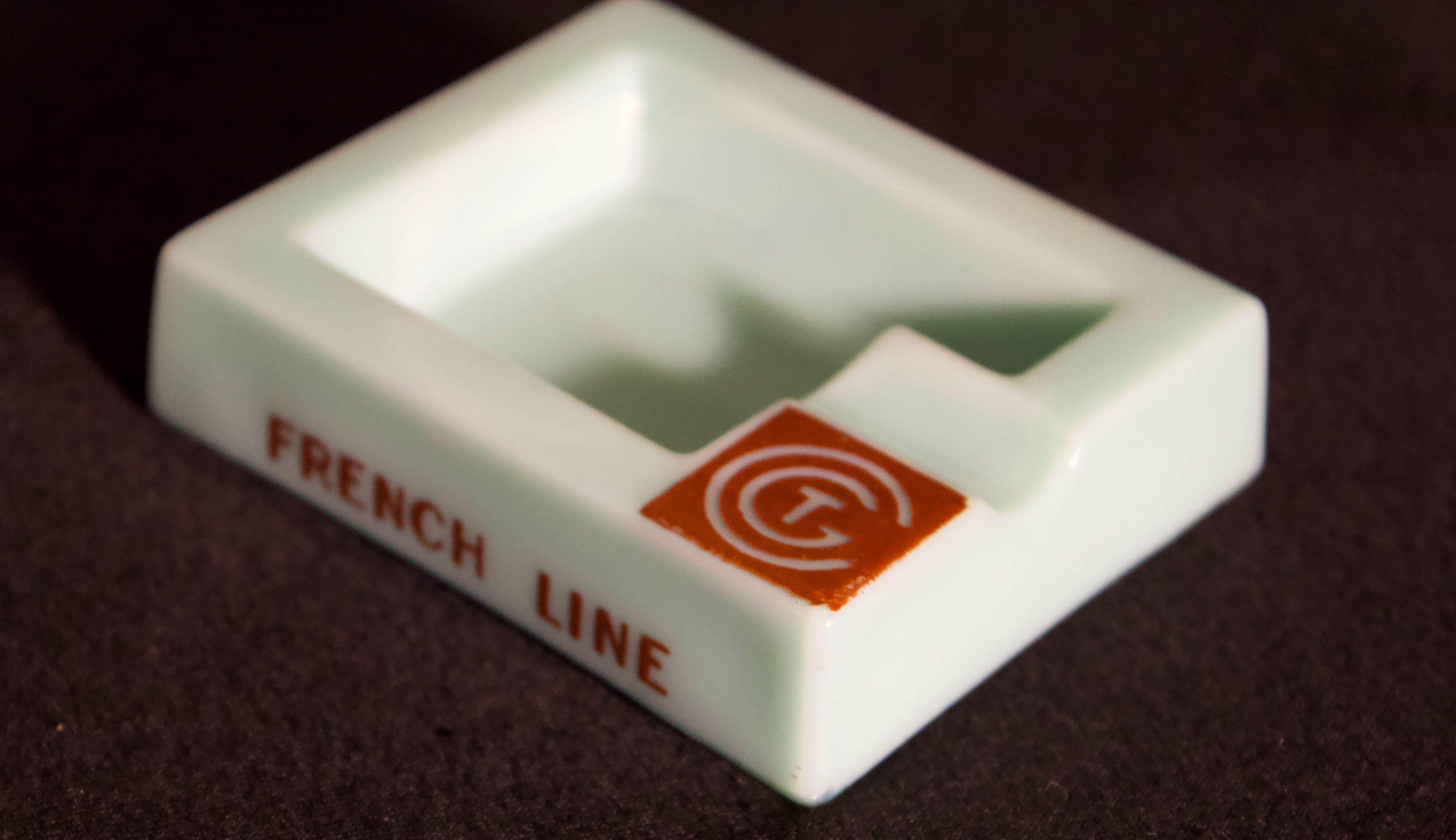 Three opalex ashtrays at the Logo of the Trans-Atlantic General Company - French Line - Model created by Jean Luce for the cruises of the liner Normandy and France