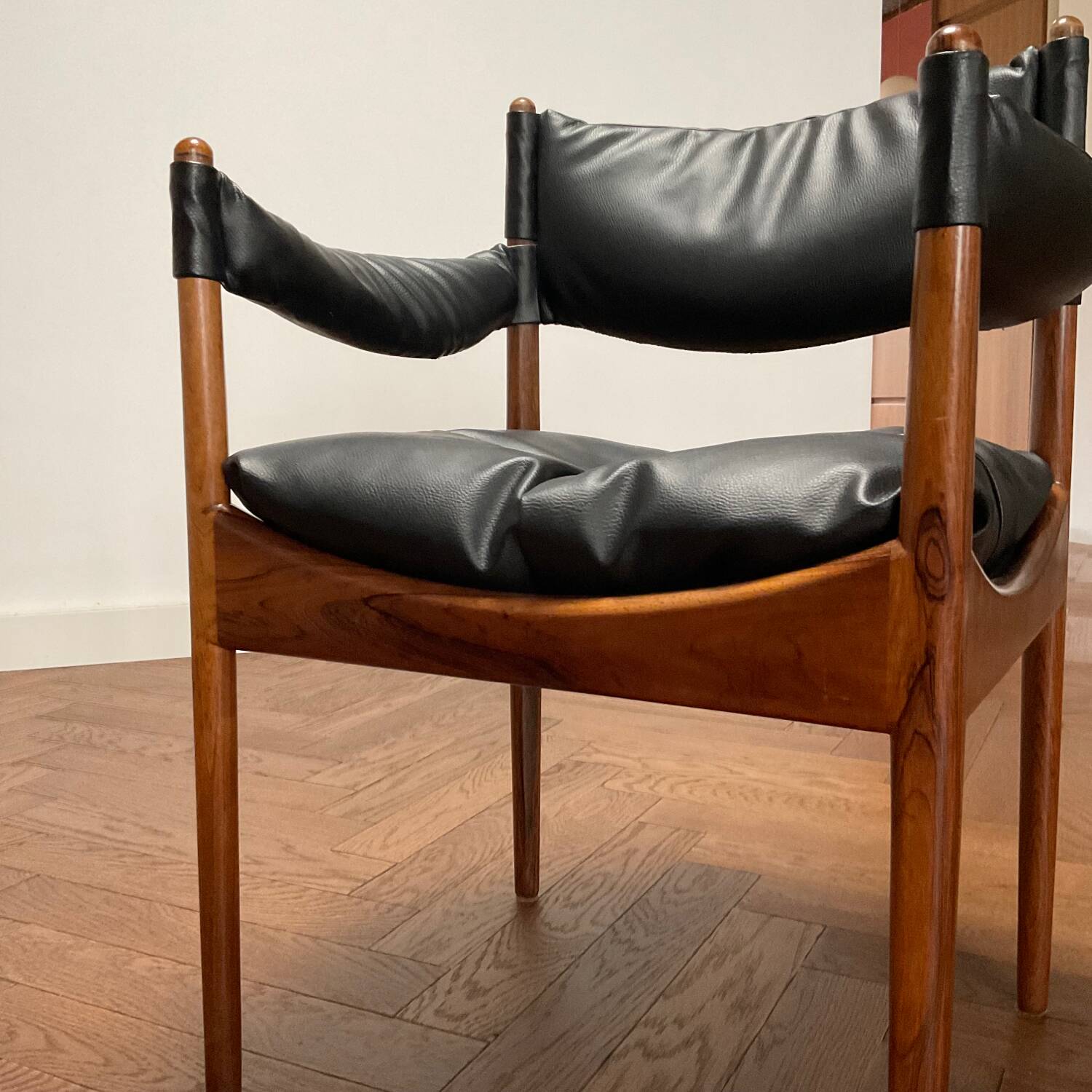 Chair with armrests by Kristian Solmer Vedel