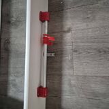 vintage white wall shelf 3 shelf rod with red hooks
