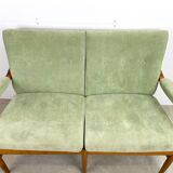 Two-seater sofa from the sixties with green upholstery