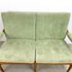 Two-seater sofa from the sixties with green upholstery