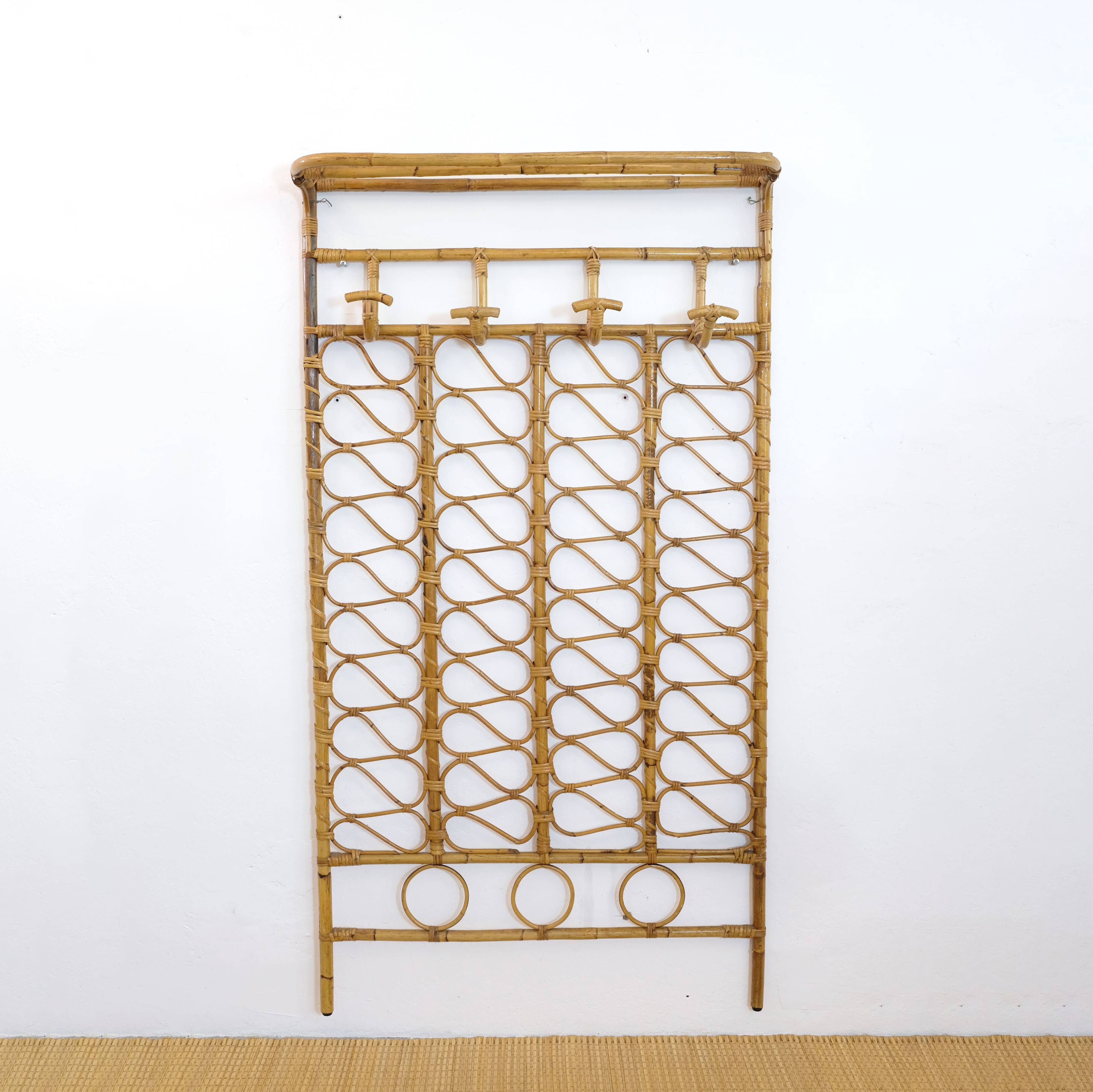 Large rattan wall coat rack, Italy, 1960s.