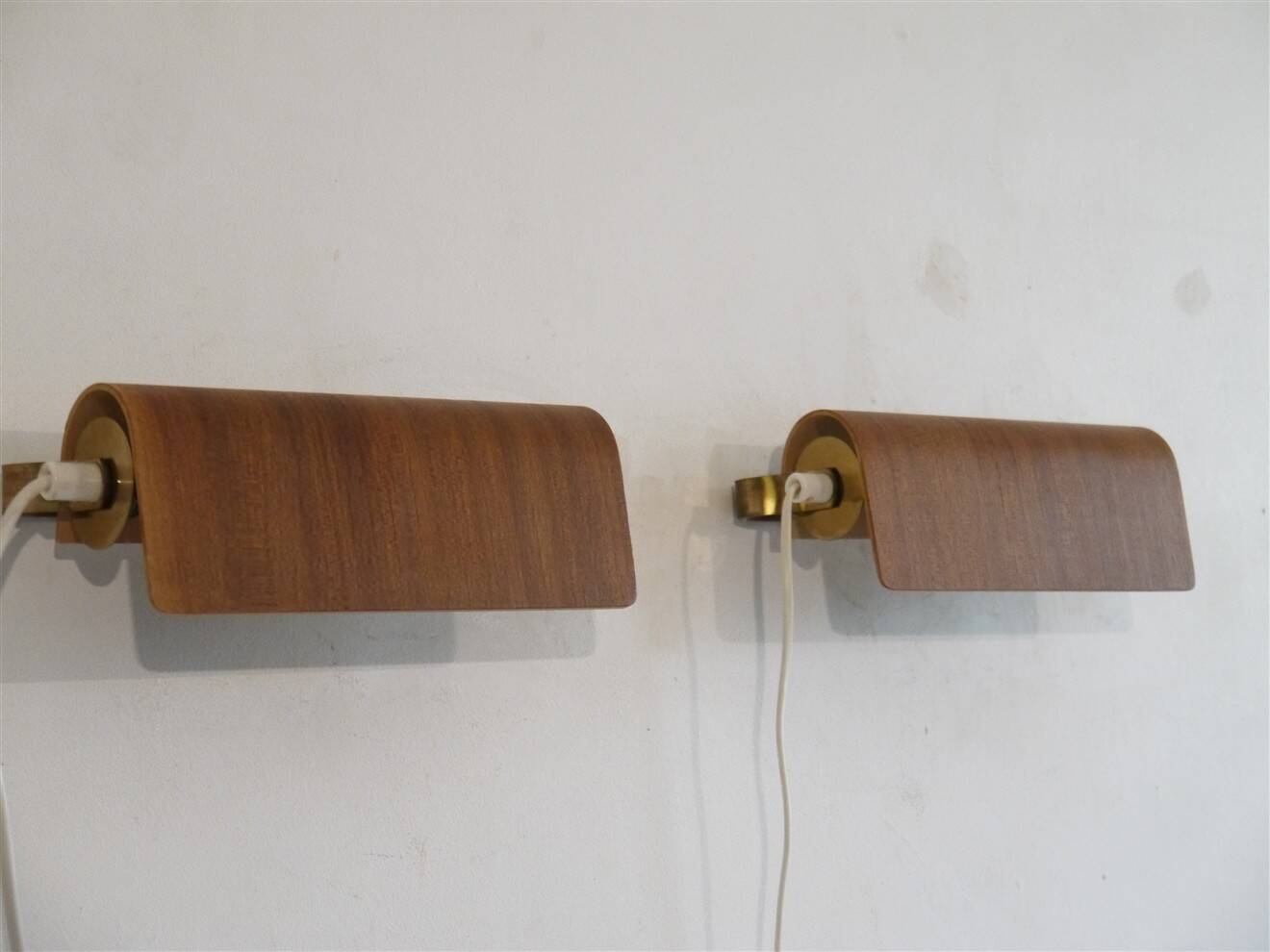 Pair of Scandinavian wall lights in teak from the 1960s.