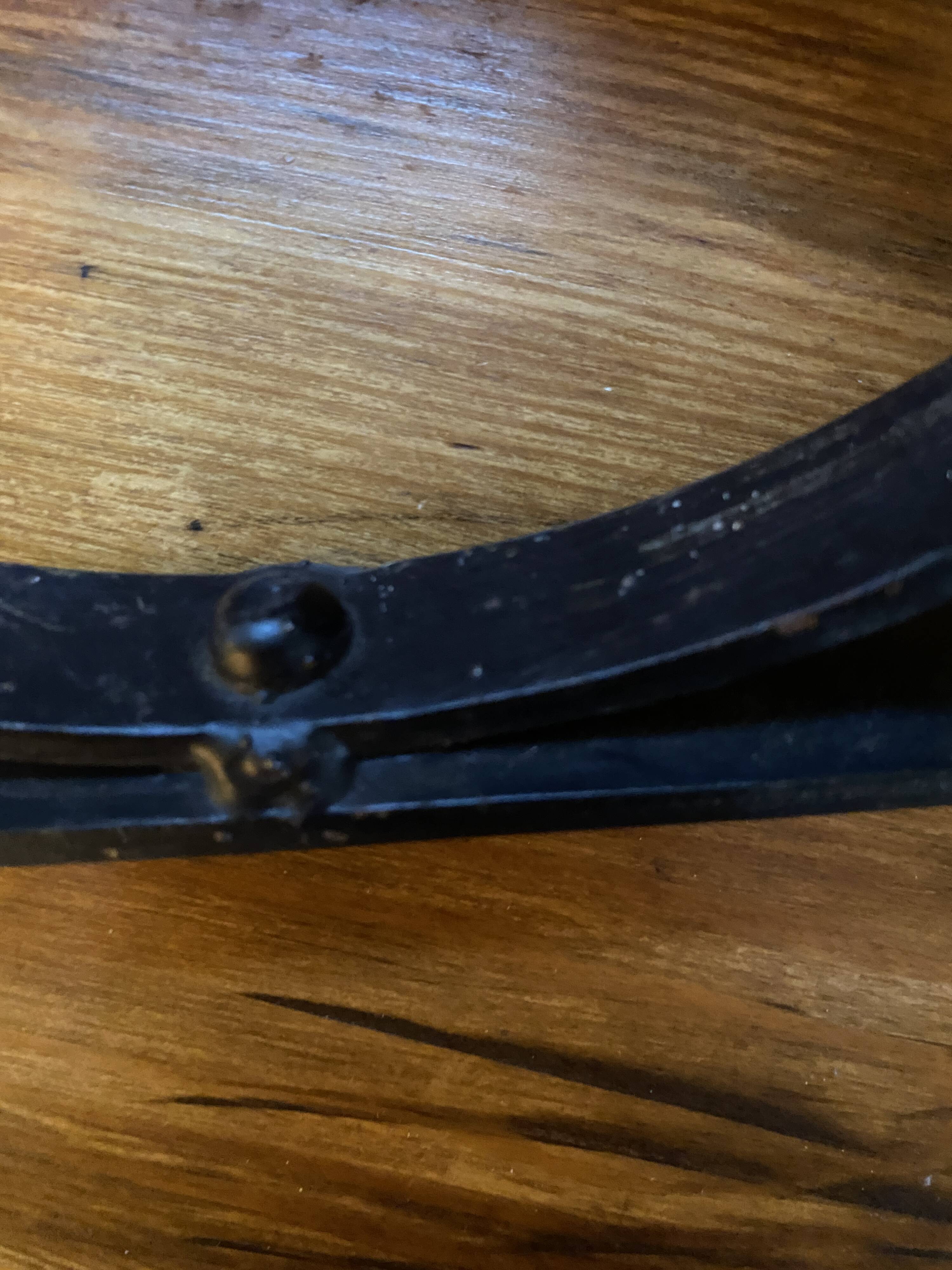 Wrought iron wall light, fabric cable