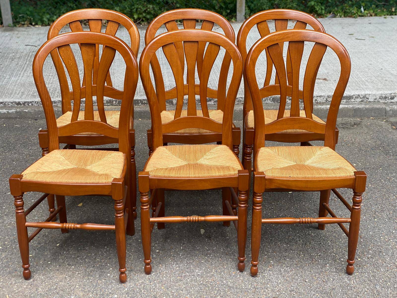6 country-style chairs in solid cherry wood with rush seats from the 1990s.