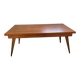 Vintage table with tapered legs.