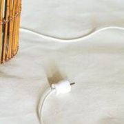 Mid-century rattan floor lamp, in the style of Louis Sognot.