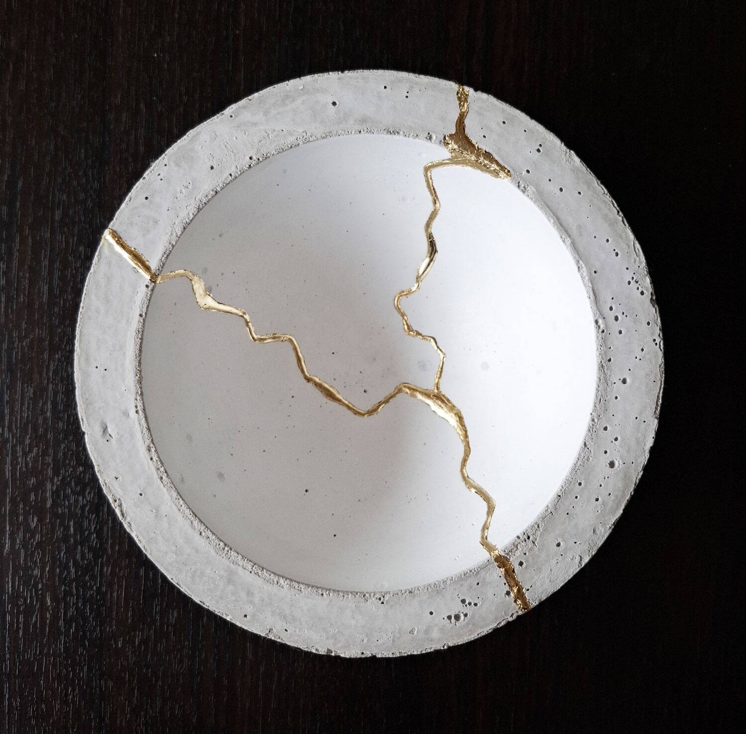 Kintsugi-inspired concrete and gold leaf cup