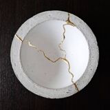 Kintsugi-inspired concrete and gold leaf cup
