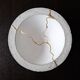 Kintsugi-inspired concrete and gold leaf cup