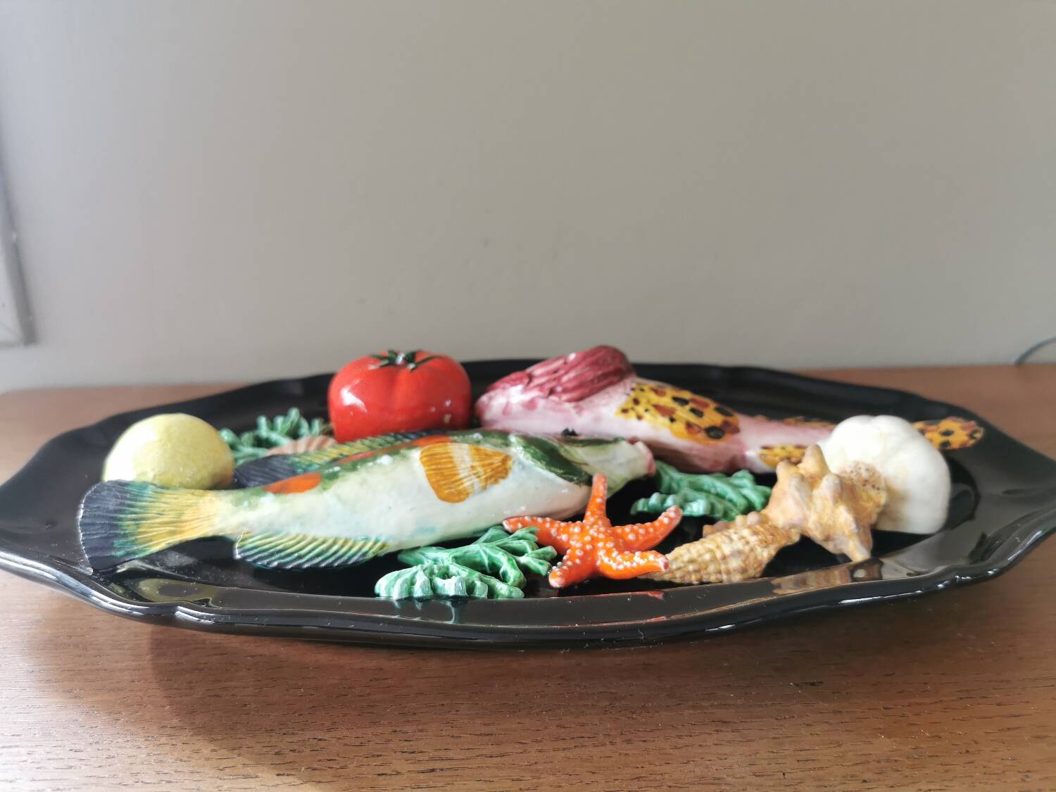 Vintage barbotine dish with fish decoration in relief