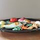 Vintage barbotine dish with fish decoration in relief