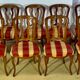 12 chairs in oak, carved wood with fleurette decorations, fabric seat