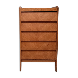 High wooden chest of drawers in the 50s