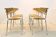 Thonet dining chairs stacked in chrome and beech