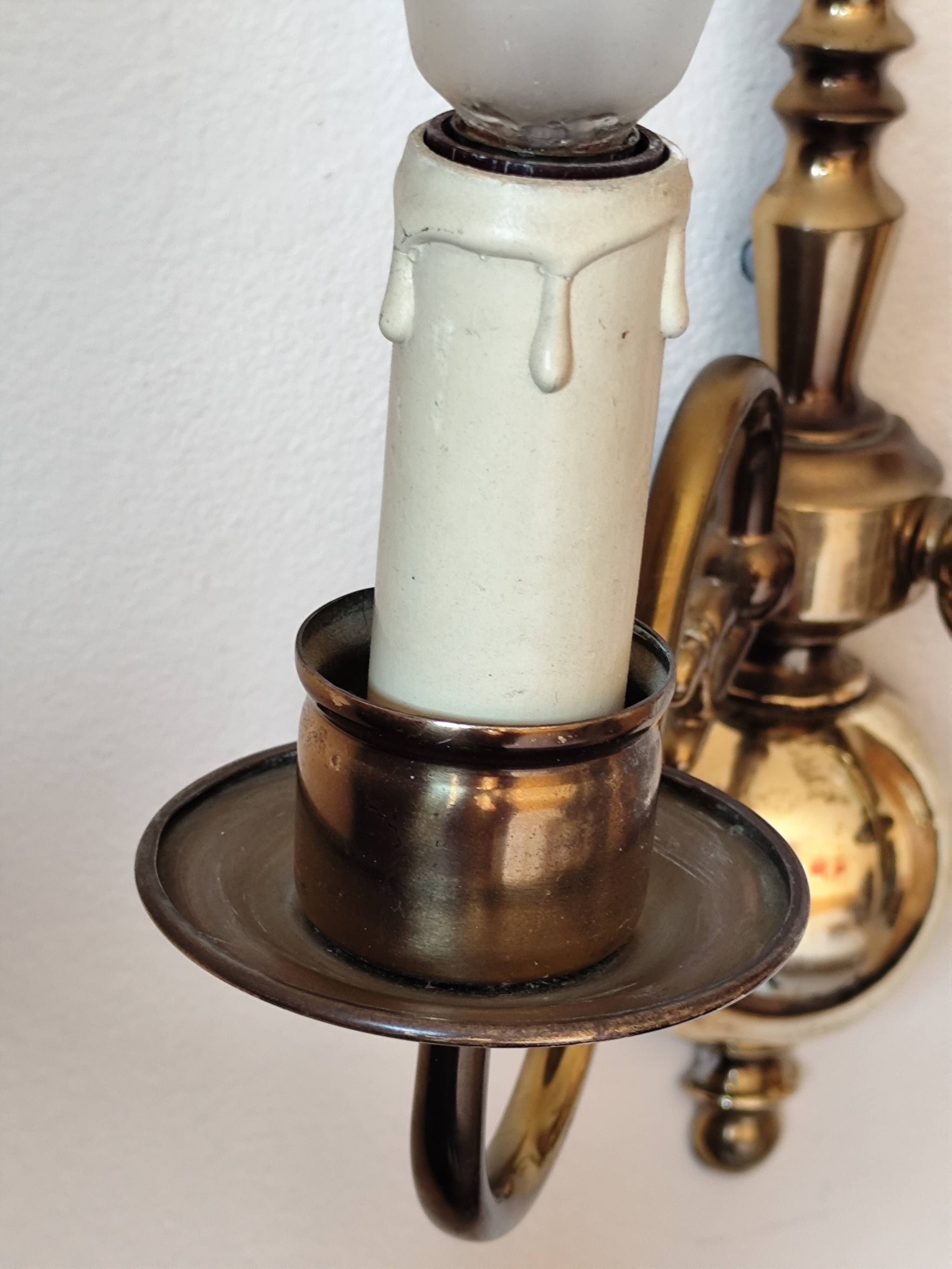 Pair of Dutch style 2-light brass wall lights