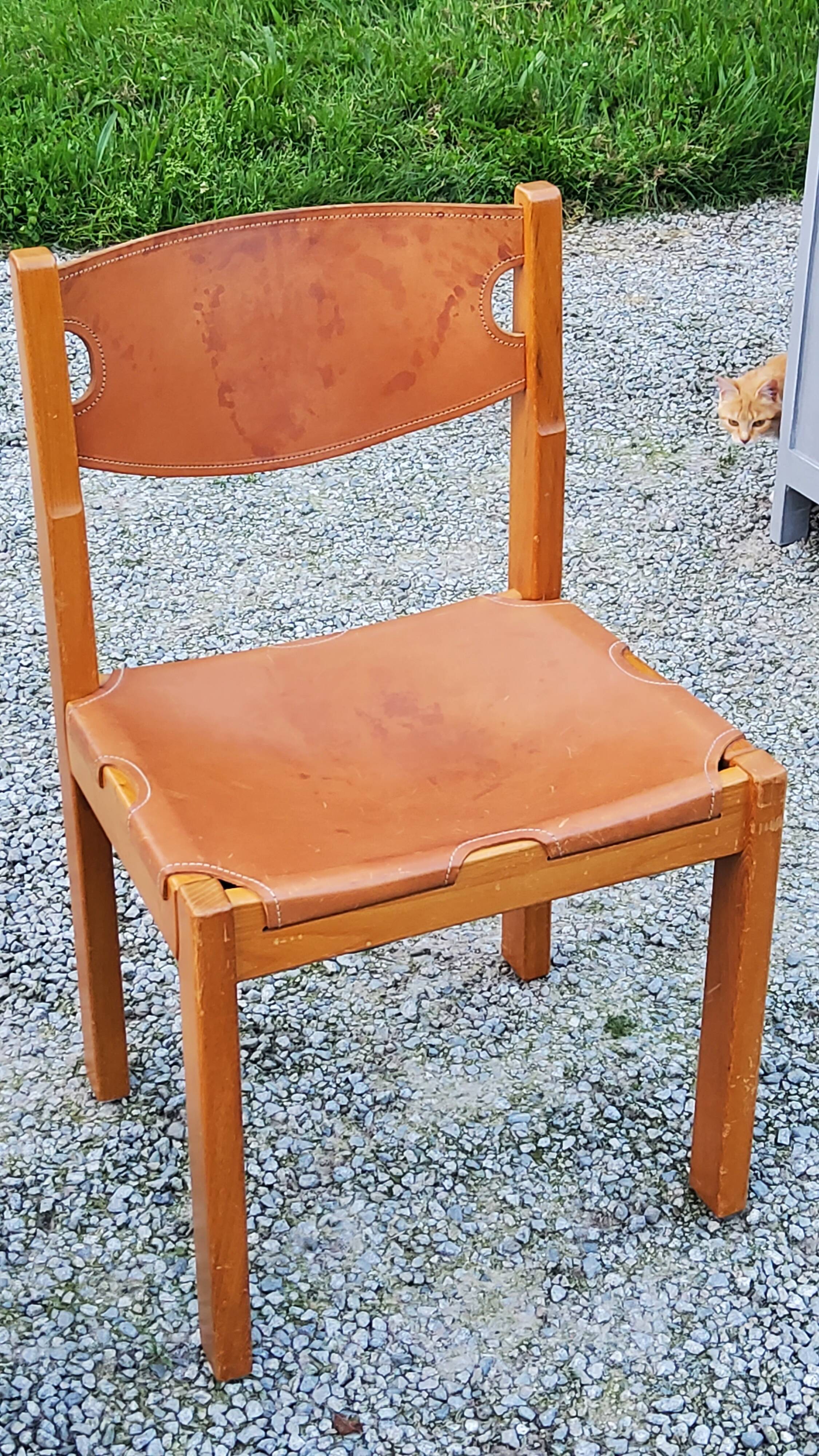 Pair of brutalist chairs in elm and stretched leather with saddle stitching Self publisher