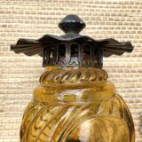 Medieval style metal and amber glass wall lamp