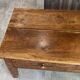 Rustic farmhouse coffee table made of solid wood with 2 drawers from the 1930s.