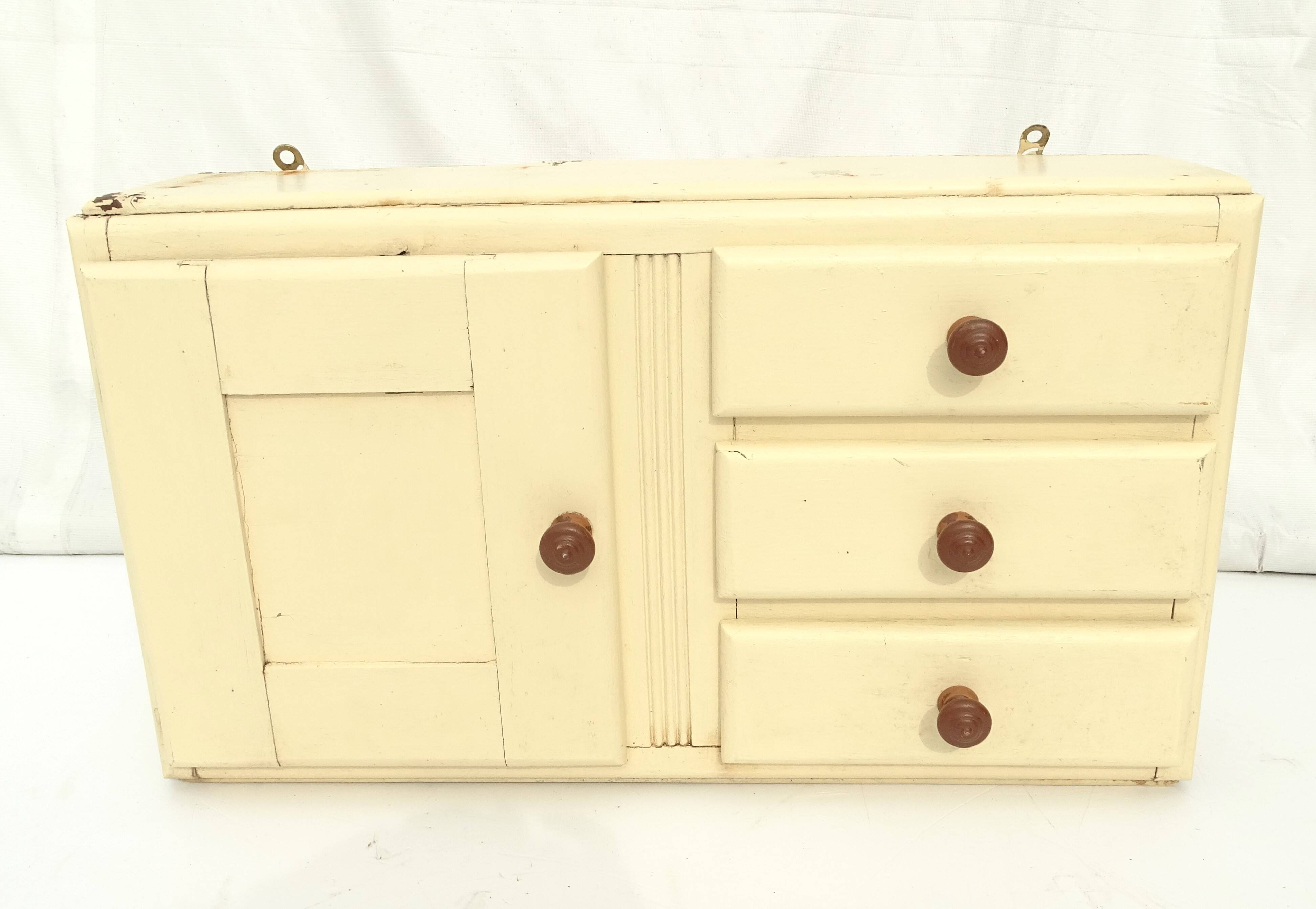 Small vintage wooden wall cupboard.