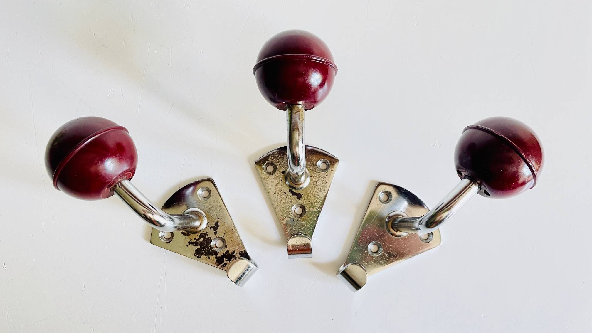 Chrome and bakelite coat hooks from the 70s