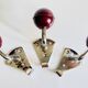 Chrome and bakelite coat hooks from the 70s