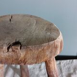 Old small country stool in raw wood - tripod base