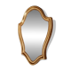 Vintage baroque mirror in gilded wood in the Louis XV style.