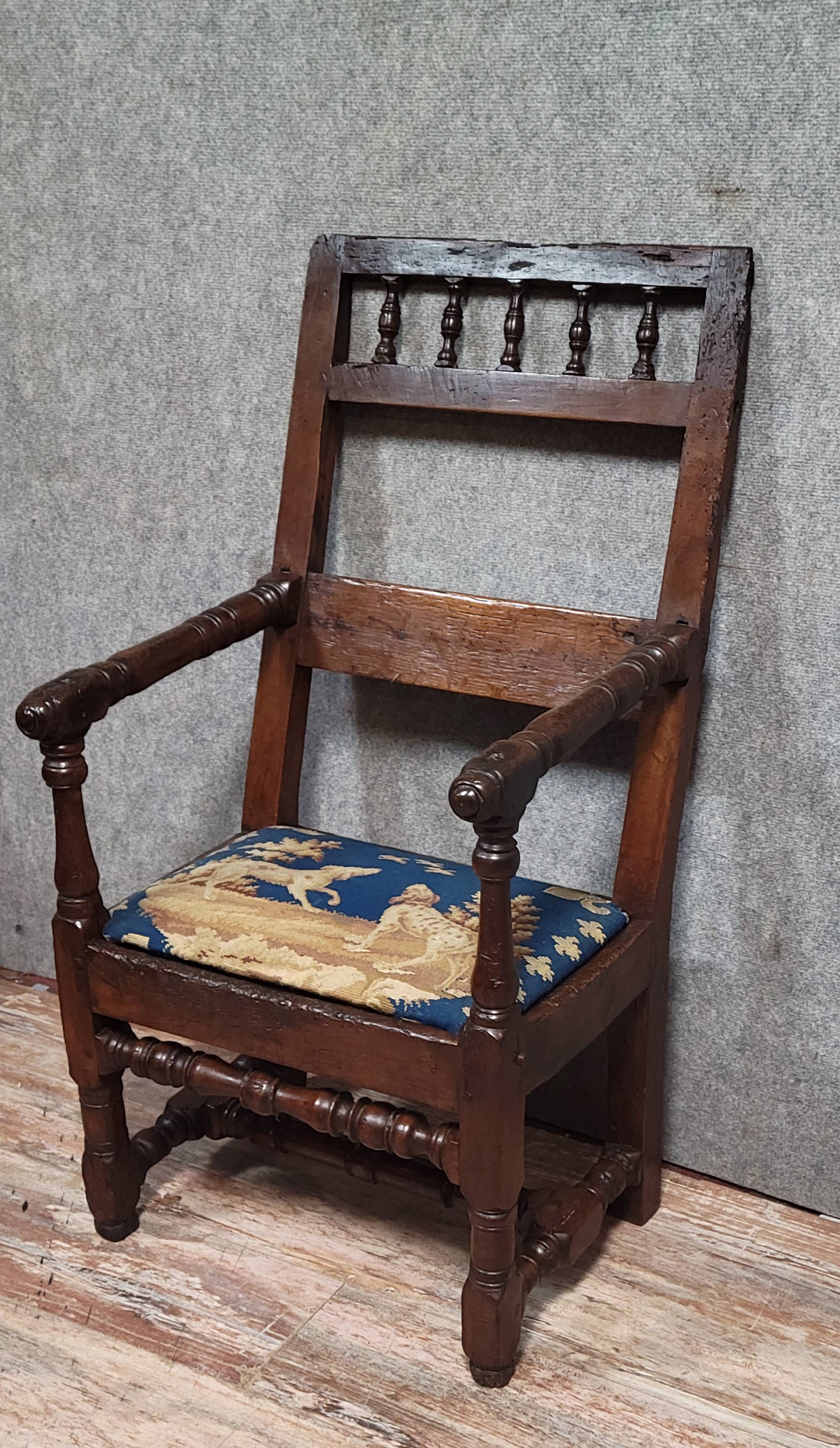 Louis XIII period armchair in solid wood