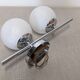 Double Space Age wall light in frosted white glass, France circa 1970.