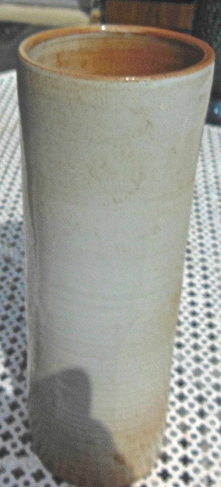 Enamelled ceramic roller vase