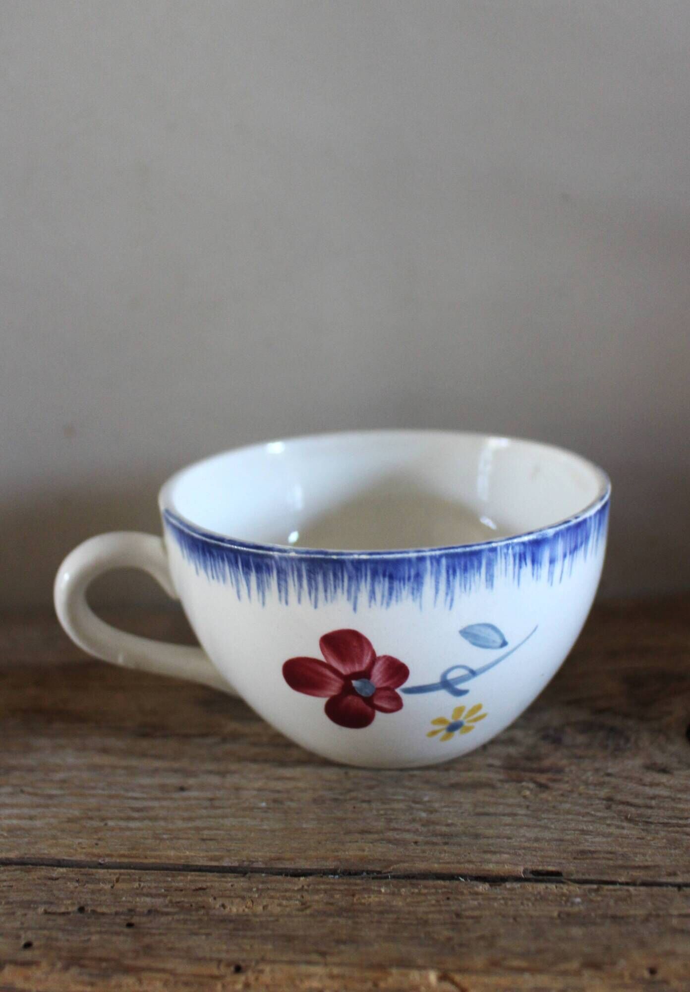 A set of two Digoin Sarreguemines Marylou Rose Art Deco cups.