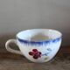 A set of two Digoin Sarreguemines Marylou Rose Art Deco cups.