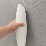 Wall lamp from Paulmann with white opal glass shade.